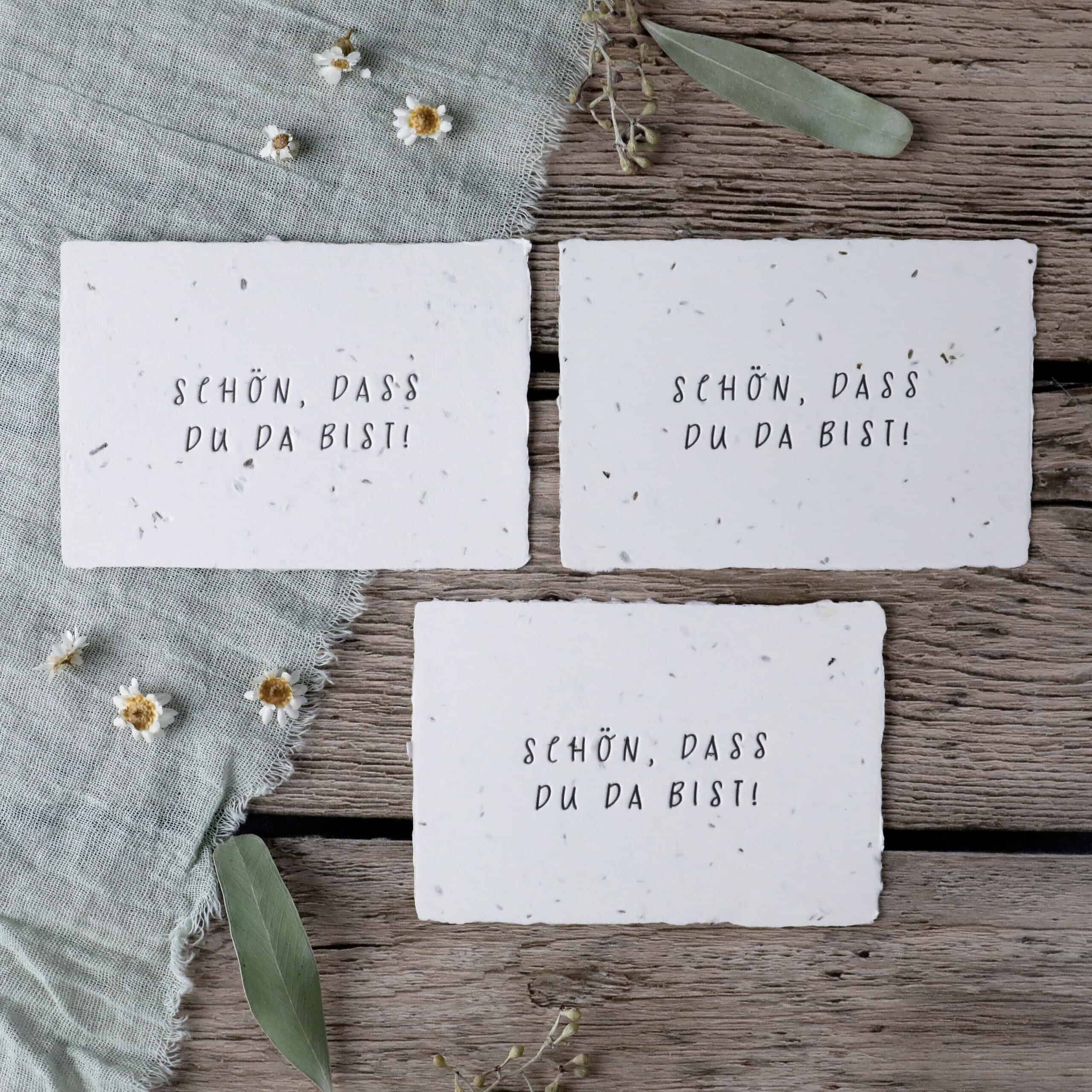 Gastgeschenk Samenpapier mit Aufschrift "Schön, dass du da bist" mit Letterpress-Prägedruck