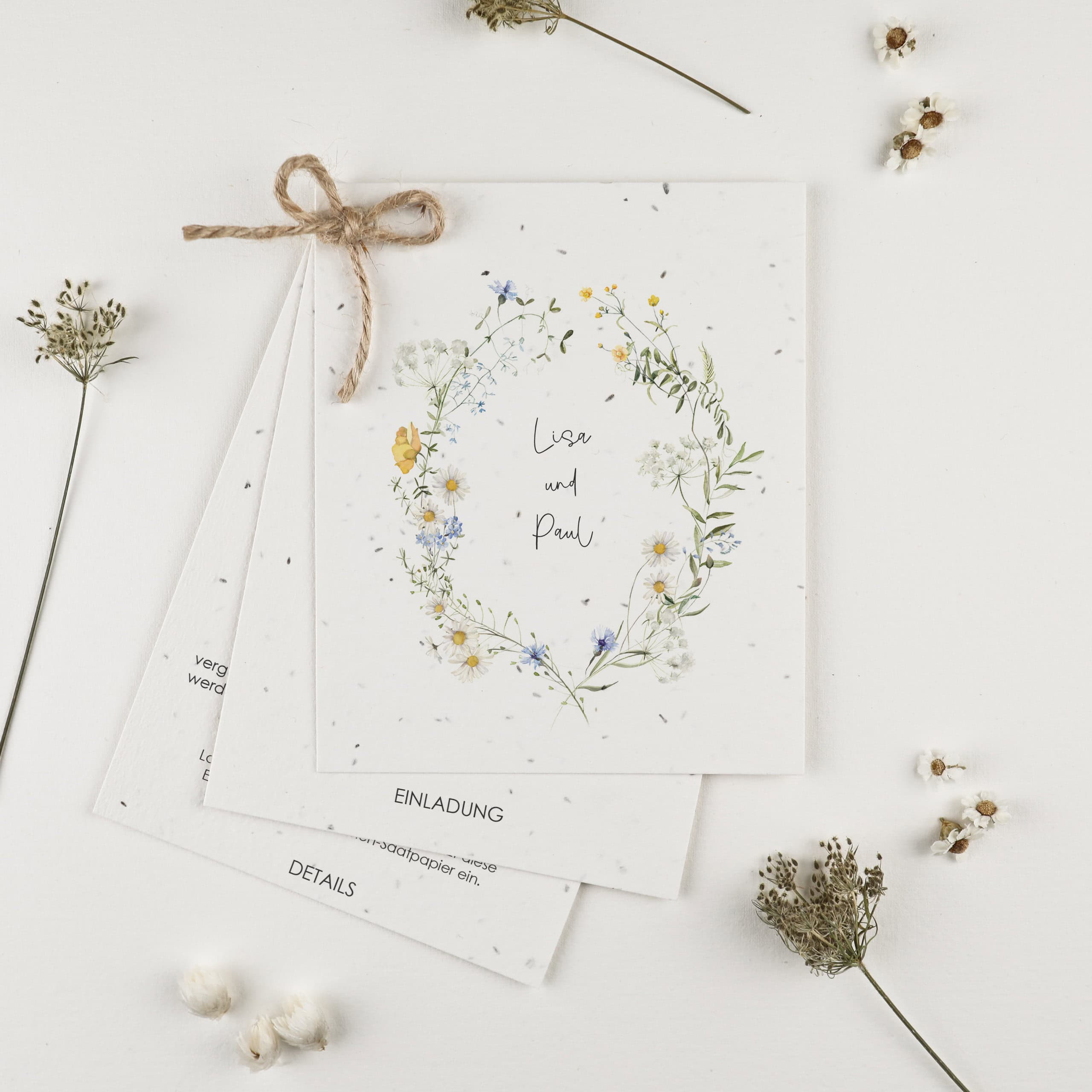 Mehrteilige, florale Hochzeitseinladung aus handgeschöpftem Saatpapier mit Wildblumen-Samen und Platz für Details und Einladungstexte